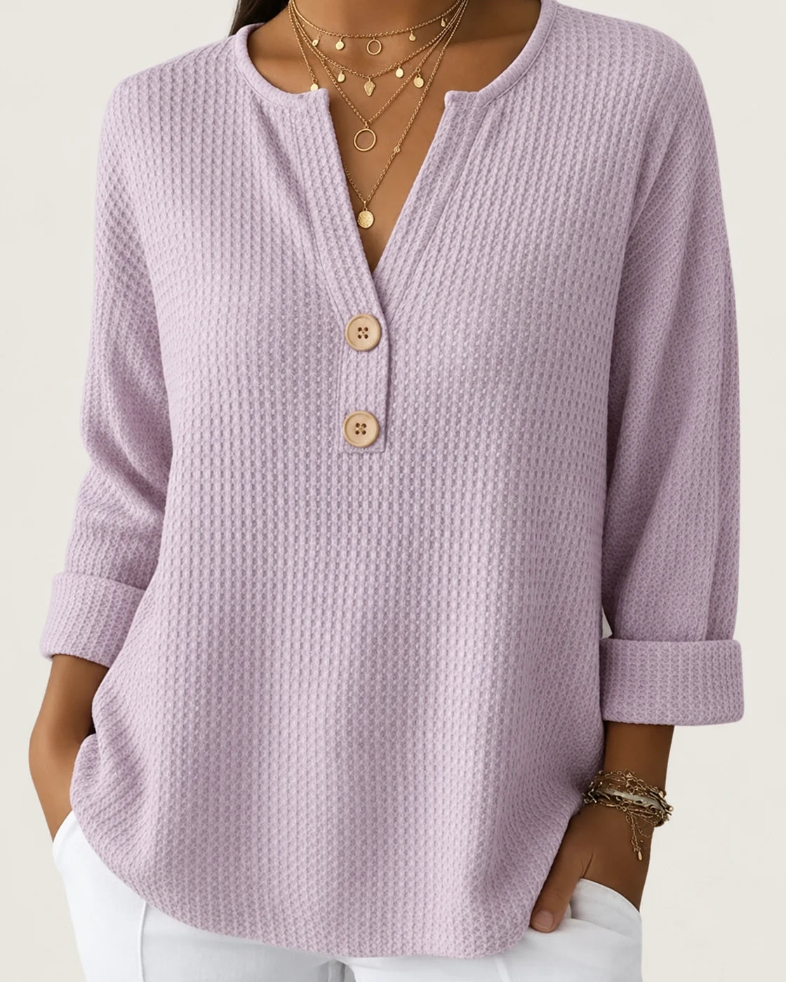 Lucía · Jersey Henley gofrado con botones